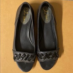 Comfy black flats with Nike Air technology